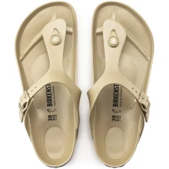 Shop Birkenstock Gizeh Essentials Glamour Gold